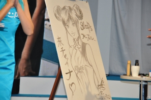 【TGS 2012】島本和彦先生が汗だくで描く力強い「張飛」にどんどん命が吹き込まれるッ！サービスでコンパニオンも直筆イラストに！？の画像25