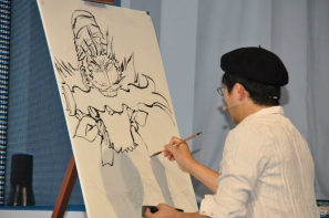 【TGS 2012】島本和彦先生が汗だくで描く力強い「張飛」にどんどん命が吹き込まれるッ！サービスでコンパニオンも直筆イラストに！？の画像8