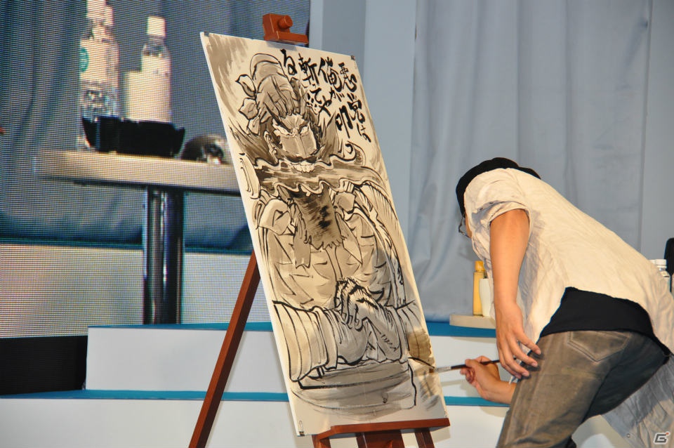 【TGS 2012】島本和彦先生が汗だくで描く力強い「張飛」にどんどん命が吹き込まれるッ！サービスでコンパニオンも直筆イラストに！？の画像16