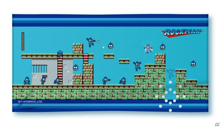 E缶デザインのクッションやステージを模したバスタオルが当たる