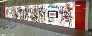 iOS/Android「スクールガールストライカーズ」36人の女の子が集合した壁面ポスターが1月9日より新宿駅に登場！持ち帰り可能な特製シールも設置の画像1