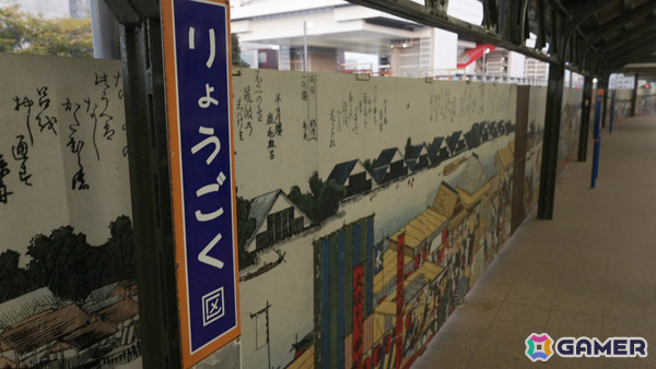 両国駅3番線ホームの巨大モニターに魔人力士が出現！屋外広告「PlayStation 5『魔人力士、降臨。』at 両国駅」が展開の画像