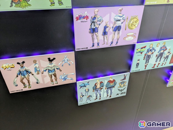 「スト6」オンリーショップレポート：ゲームフェイス機能を模したフォトスポットでは壁面に各ファイターの表情一覧が掲示！角度によってはイラストが変化の画像14