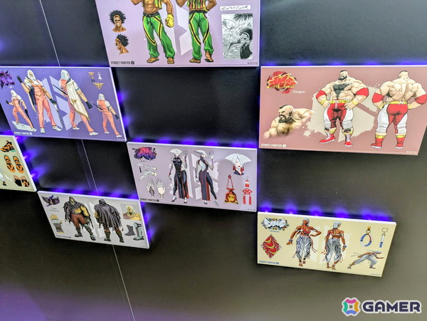 「スト6」オンリーショップレポート：ゲームフェイス機能を模したフォトスポットでは壁面に各ファイターの表情一覧が掲示！角度によってはイラストが変化の画像18