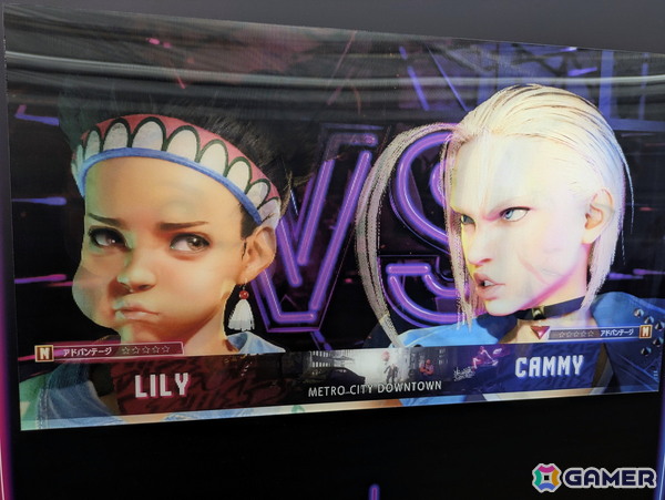 「スト6」オンリーショップレポート:ゲームフェイス機能を模したフォトスポットでは壁面に各ファイターの表情一覧が掲示!角度によってはイラストが変化の画像