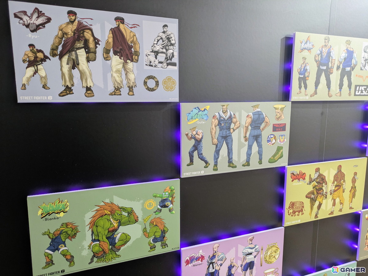 「スト6」オンリーショップレポート:ゲームフェイス機能を模したフォトスポットでは壁面に各ファイターの表情一覧が掲示!角度によってはイラストが変化の画像