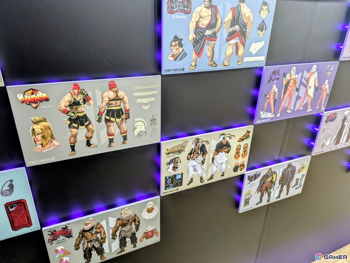 「スト6」オンリーショップレポート:ゲームフェイス機能を模したフォトスポットでは壁面に各ファイターの表情一覧が掲示!角度によってはイラストが変化の画像