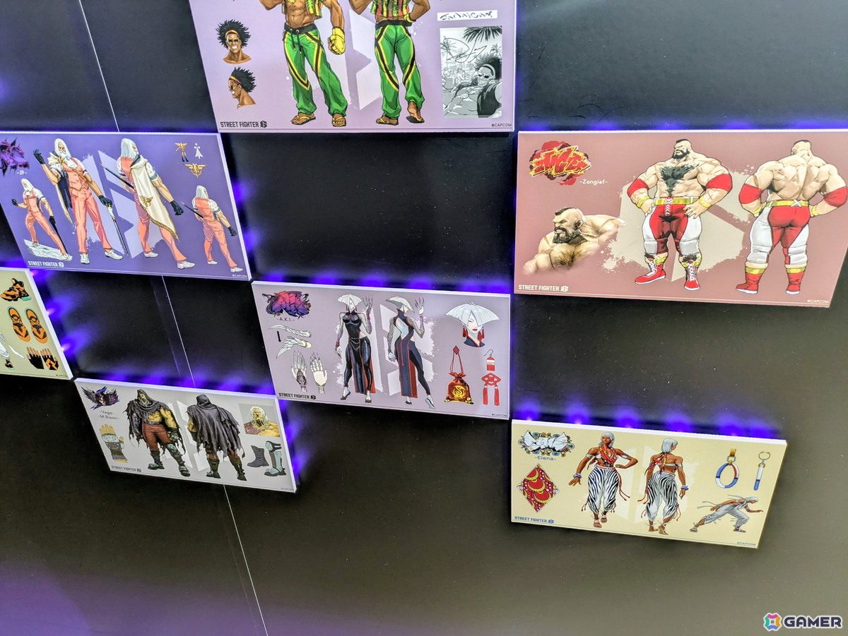 「スト6」オンリーショップレポート:ゲームフェイス機能を模したフォトスポットでは壁面に各ファイターの表情一覧が掲示!角度によってはイラストが変化の画像