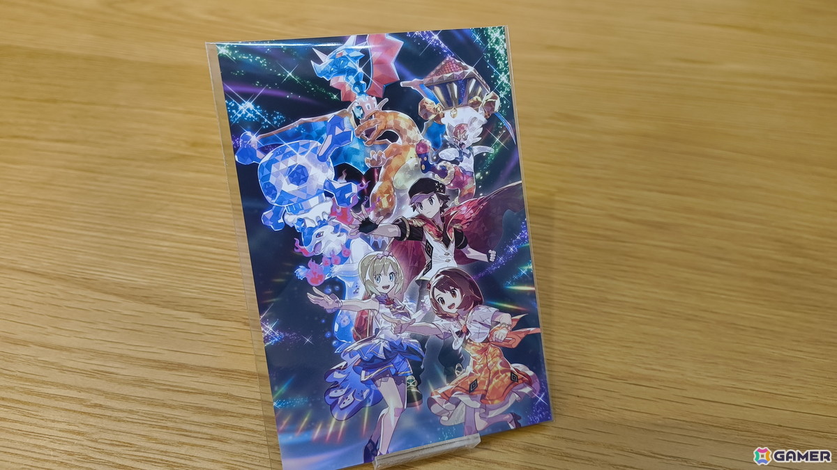 「『ポケモンマスターズ EX』6.5周年記念特設スペース」の事前内覧会をレポート!歴代のトレーナーとポケモンたちのスタンディパネルが圧巻、記念グッズの販売もの画像