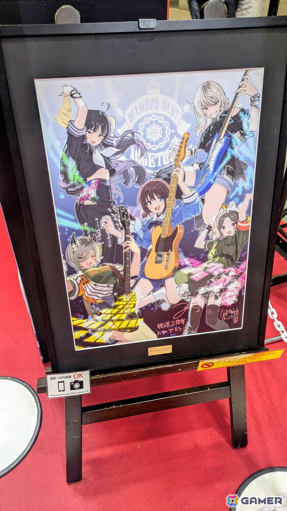 「ガルクラ」「ガルリフ」トゲナシトゲアリとCanna Lilyの等身大パネルがデザインされた巨大な壁面展示が登場！裏面にはゲームの新情報も【AnimeJapan 2026】の画像4