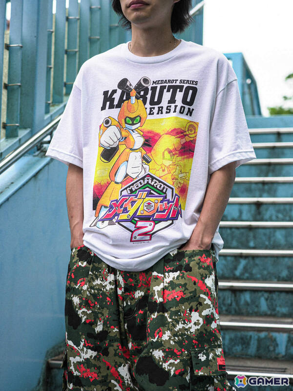 DANと「メダロット2」による公式コラボTシャツの受注販売が開始!1999年当時のゲームパッケージを再現、味わい深く経年変化していくの画像