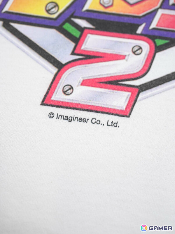 DANと「メダロット2」による公式コラボTシャツの受注販売が開始!1999年当時のゲームパッケージを再現、味わい深く経年変化していくの画像