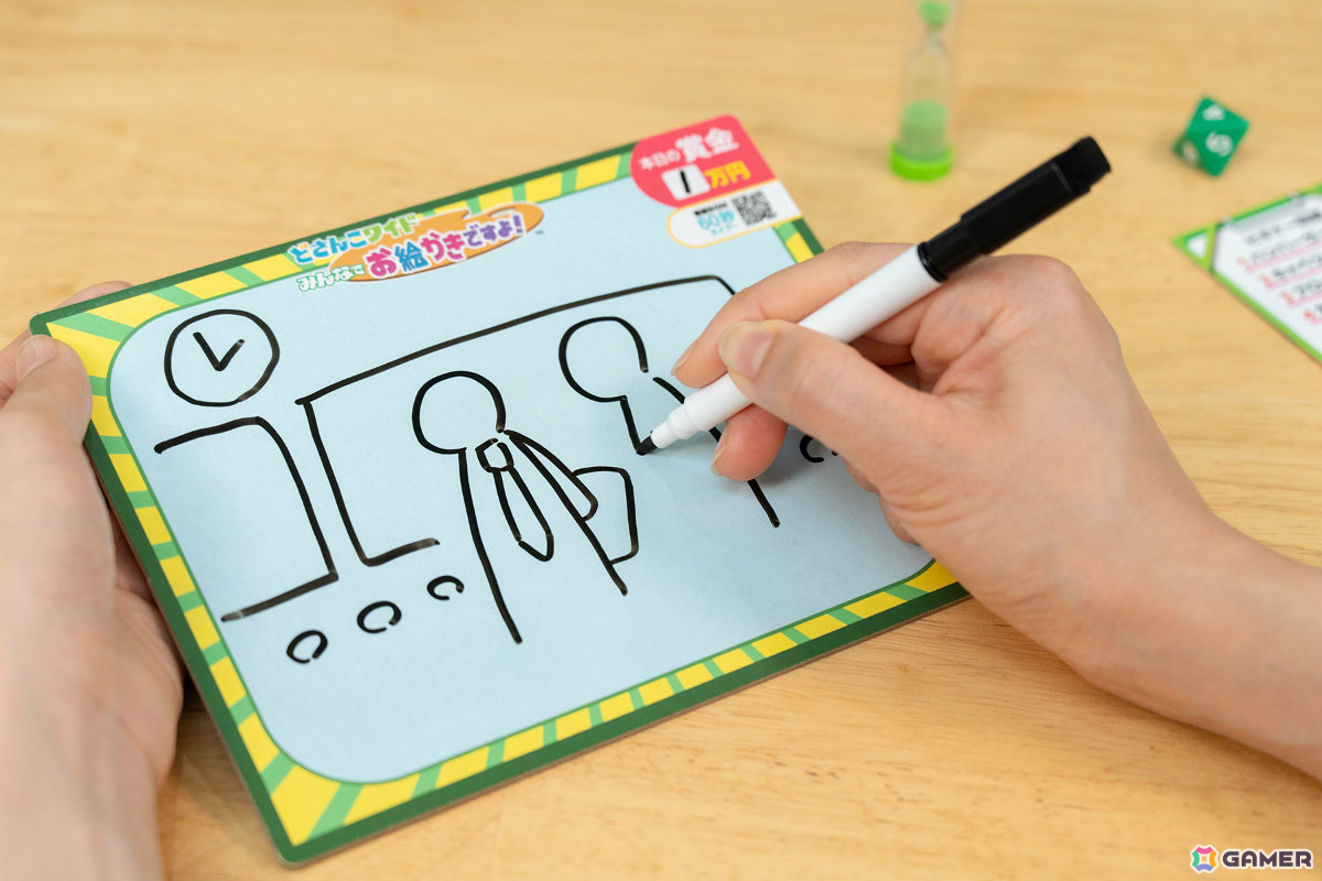 出題者が問題をホワイトボードに描いている様子