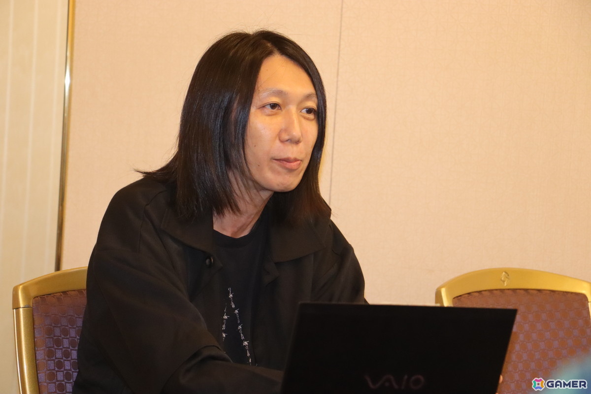 鈴木崇弘氏